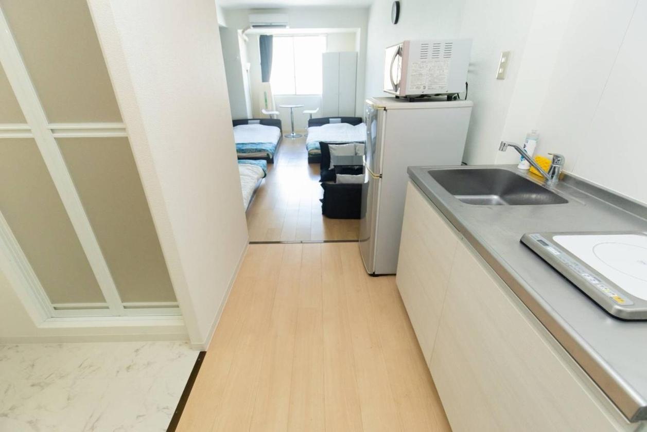 ゲストハウス大国町駅前 Apartamento *