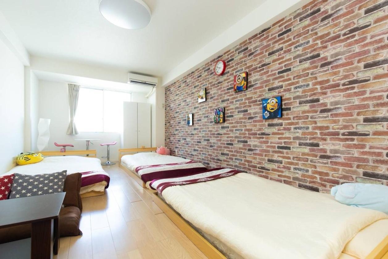 Apartamento ゲストハウス大国町駅前 *